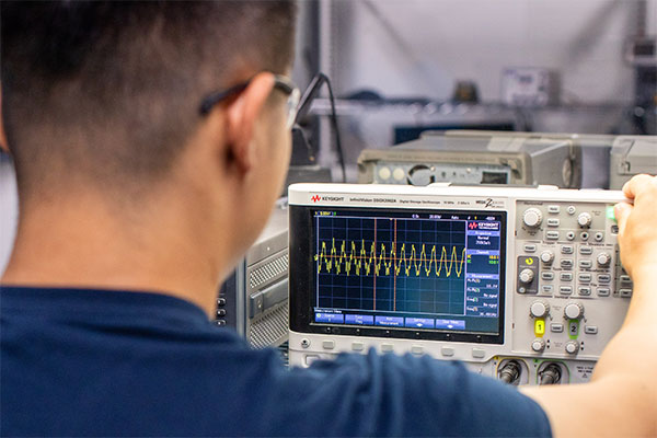 Student looking at a monitoring screen