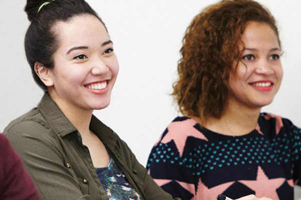 two students smiling