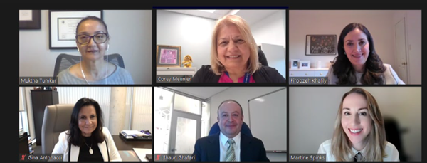 A Zoom meeting with six individuals smiling at the camera