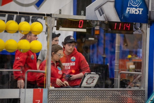 Students competing at the FIRST Robotics Competition