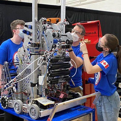 Students competing at the FIRST Robotics Competition
