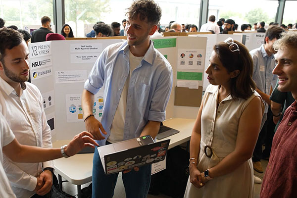 group of people listening to a presentation