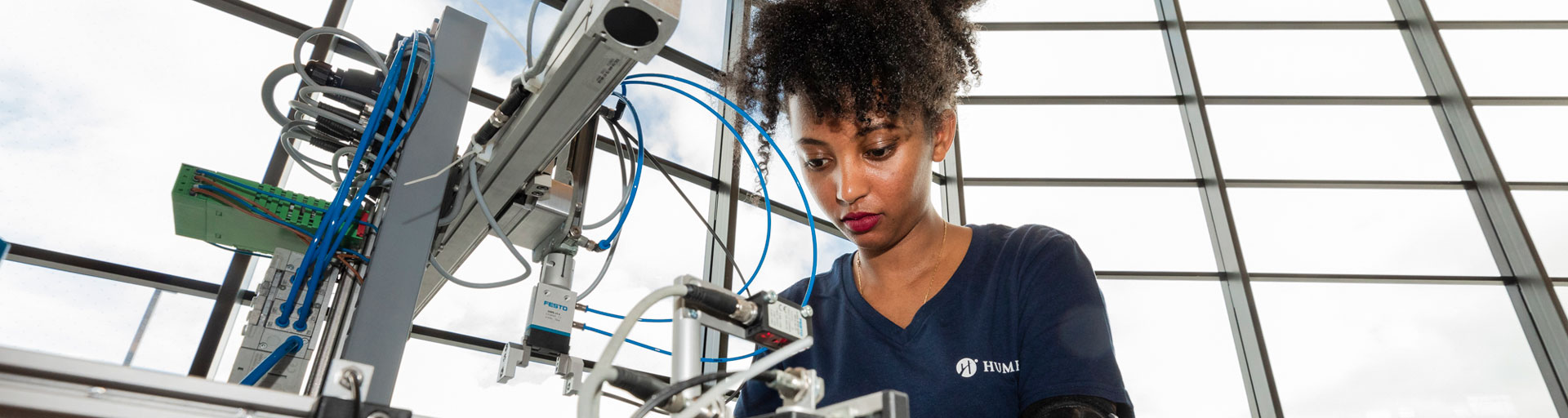 Person working on mechatronic engineering project